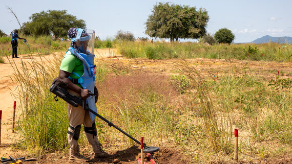 A mine Action team checking for an area for safety from land mines and UXOs at Gorom refugee camp in Juba County, Central Equatoria State. 